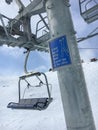 Funny slogan an a pole of a chair lift Ã¢â¬Å¾A bad day of skiing be